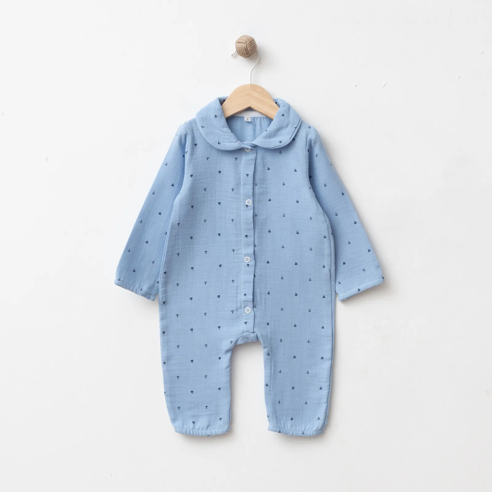 Wholesale GOTS-certified 100% cotton muslin sea print baby boy romper with rounded collar and front snap buttons, 3 to 12 months