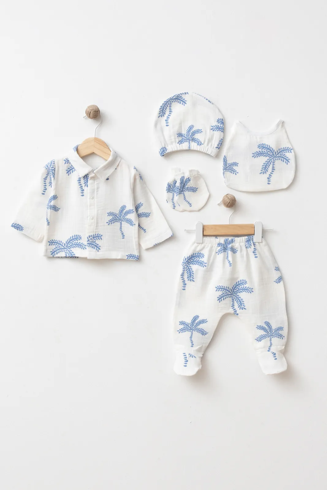 GOTS-certified 100% cotton palm print baby boy five-piece hospital set with buttoned top, footed trousers, bonnet, bib and mittens