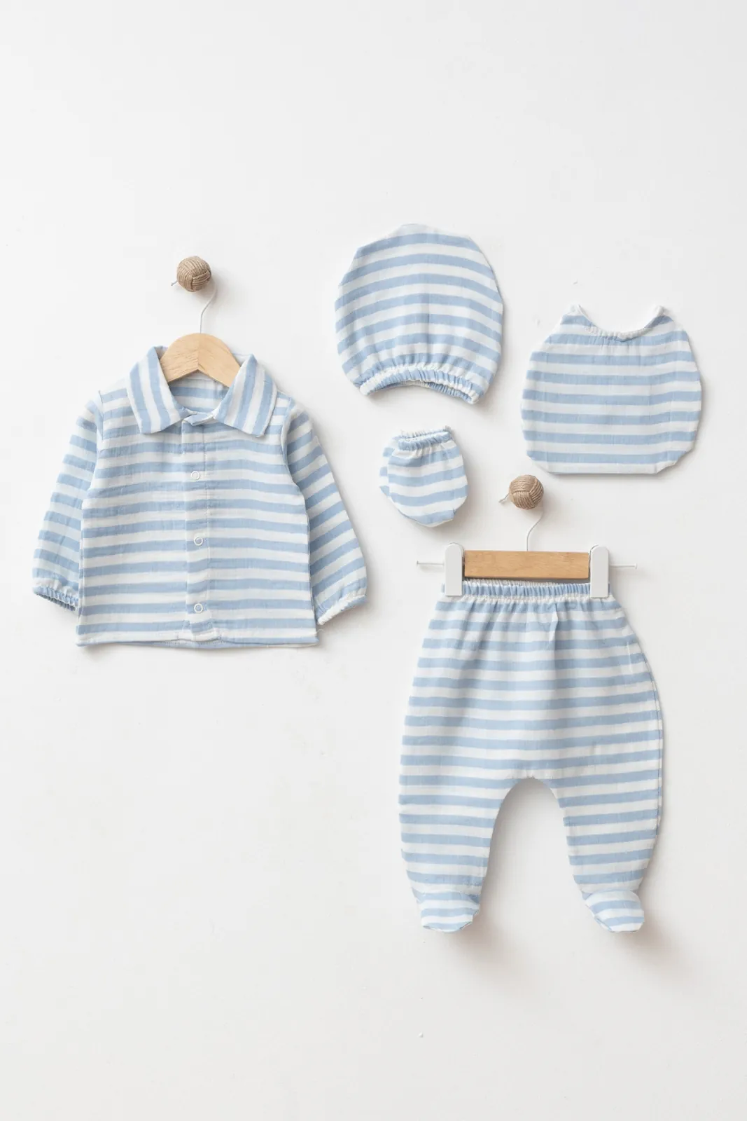 Wholesale 5-piece GOTS certified cotton baby boy hospital set with button-front top, footed trousers, hat, mittens and matching bib.